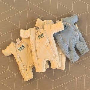 Four Merlin Magic Sleep Suits in Great Condition! Size Small (3-6 Months)